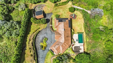 Set on nearly 8 acres of pasture in a gated Kula setting, this - photo 41