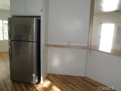 GREAT REMODELED WITH NEW PAINT, FLOORING, ROOF & APPLIANCES - photo 10