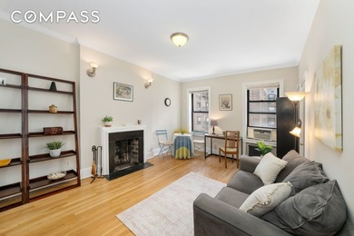 FIRST SHOWING Sunday June 7th. Nestled in a charming pre-war - photo 3