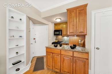 FIRST SHOWING Sunday June 7th. Nestled in a charming pre-war - photo 5