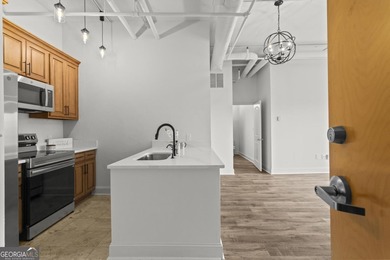 Experience elevated city living in this beautifully updated