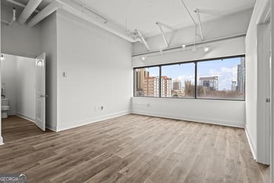 Experience elevated city living in this beautifully updated