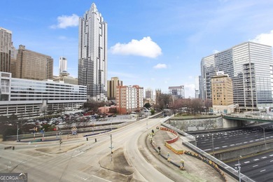 Experience elevated city living in this beautifully updated