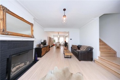 A charming brick townhouse ideally located at the crossroads of - photo 8
