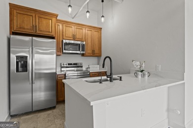 Experience elevated city living in this beautifully updated