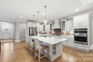 Welcome to this stunning all-brick, single-story home that truly - photo 10
