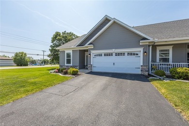 Welcome to this beautifully upgraded ranch end-unit townhome - photo 2