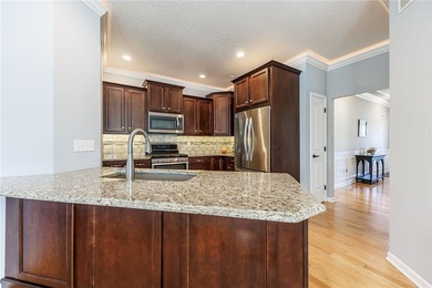 Welcome to this beautifully upgraded ranch end-unit townhome - photo 6