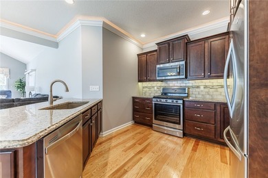 Welcome to this beautifully upgraded ranch end-unit townhome - photo 8