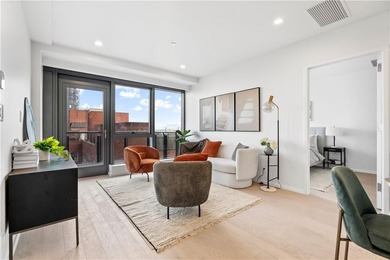 Residence 19H at Bayview Courtyard offers elevated living in a - photo 6