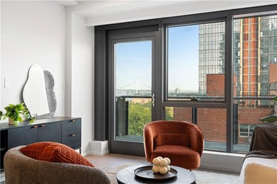 Residence 19H at Bayview Courtyard offers elevated living in a - photo 7