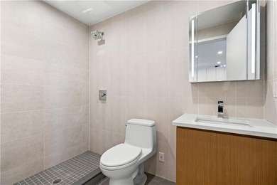Residence 19H at Bayview Courtyard offers elevated living in a - photo 9