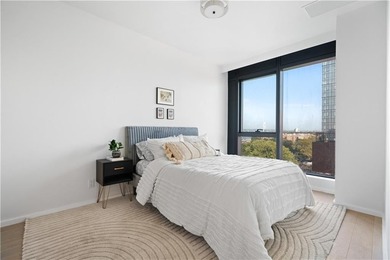 Residence 19H at Bayview Courtyard offers elevated living in a - photo 10