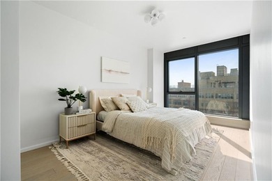 Residence 6F at Bayview Courtyard offers modern waterfront - photo 3
