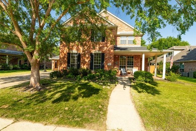 Welcome to this stunning two-story home in the highly - photo 1