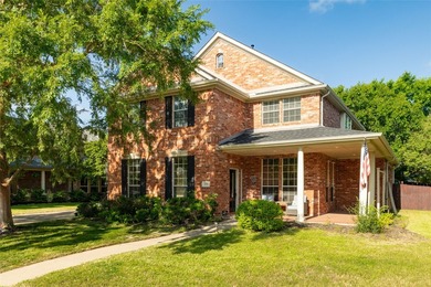 Welcome to this stunning two-story home in the highly - photo 2