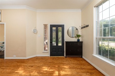 Welcome to this stunning two-story home in the highly - photo 3