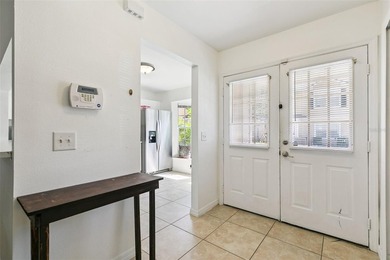 Welcome to this charming townhouse-style condominium located in - photo 3