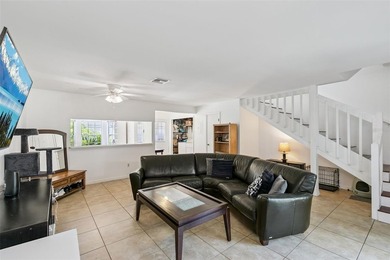 Welcome to this charming townhouse-style condominium located in - photo 4