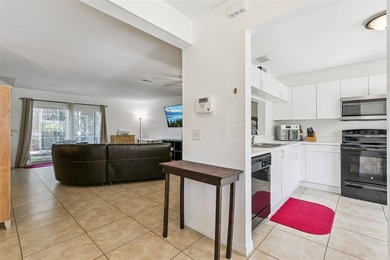 Welcome to this charming townhouse-style condominium located in - photo 6
