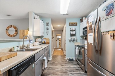 Enjoy low-maintenance living on Lake Hartwell in this beautiful - photo 4
