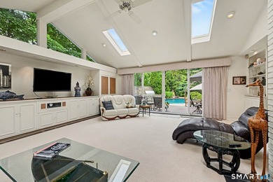 Tucked away on a quiet, tree-lined street in North Stamford - photo 15