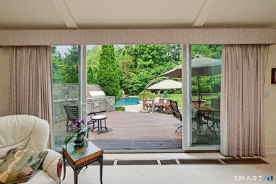 Tucked away on a quiet, tree-lined street in North Stamford - photo 16