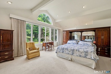 Tucked away on a quiet, tree-lined street in North Stamford - photo 17