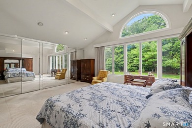 Tucked away on a quiet, tree-lined street in North Stamford - photo 19