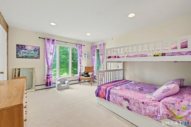 Tucked away on a quiet, tree-lined street in North Stamford - photo 21
