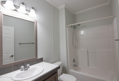 Welcome home to this charming 3-bedroom, 2-bath residence in the - photo 21