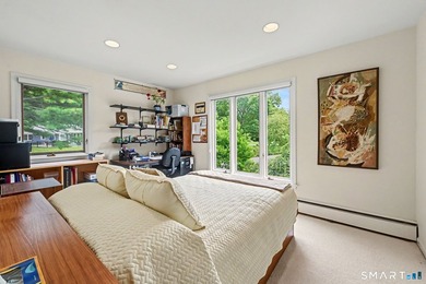 Tucked away on a quiet, tree-lined street in North Stamford - photo 22