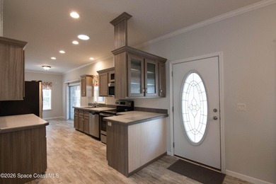 Welcome home to this charming 3-bedroom, 2-bath residence in the - photo 24