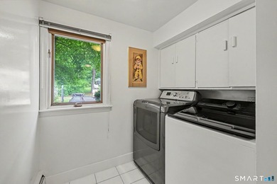 Tucked away on a quiet, tree-lined street in North Stamford - photo 25