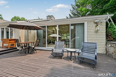 Tucked away on a quiet, tree-lined street in North Stamford - photo 26
