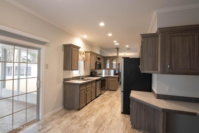 Welcome home to this charming 3-bedroom, 2-bath residence in the - photo 26