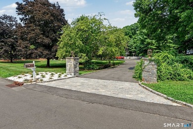 Tucked away on a quiet, tree-lined street in North Stamford - photo 28