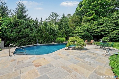 Tucked away on a quiet, tree-lined street in North Stamford - photo 30