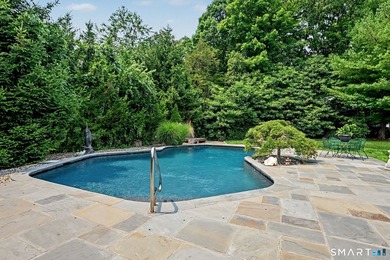 Tucked away on a quiet, tree-lined street in North Stamford - photo 31