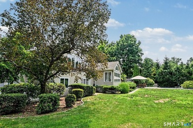 Tucked away on a quiet, tree-lined street in North Stamford - photo 33