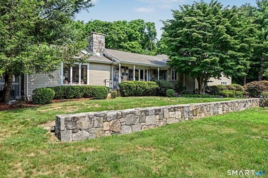 Tucked away on a quiet, tree-lined street in North Stamford - photo 34