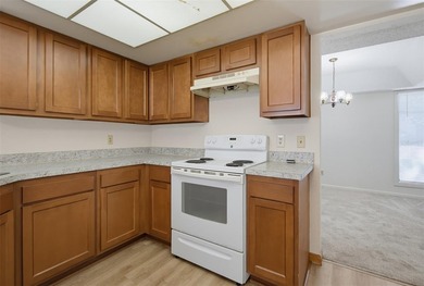This 2 bedroom, 2 bathroom first floor condo is conveniently - photo 11