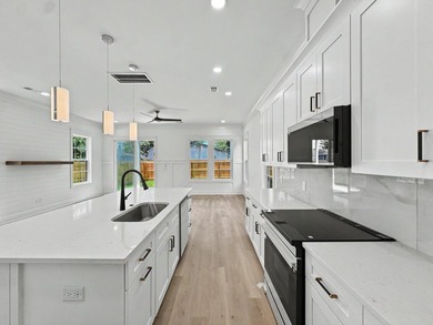 Welcome to 1988 Irving Avenue, a beautifully crafted new - photo 12