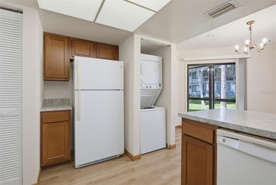 This 2 bedroom, 2 bathroom first floor condo is conveniently - photo 13