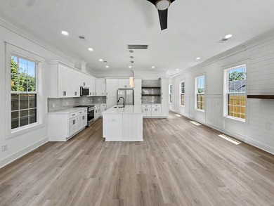 Welcome to 1988 Irving Avenue, a beautifully crafted new - photo 14