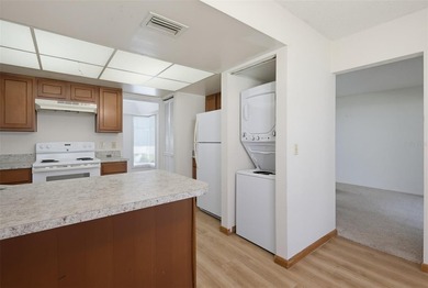 This 2 bedroom, 2 bathroom first floor condo is conveniently - photo 15