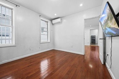 This spacious semi-detached brick one-family duplex is ideally - photo 8