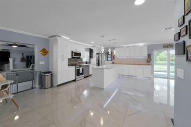 Welcome to a stunning move-in ready home on almost 2 ACRES! Over - photo 9