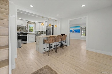 Beautifully updated 4 bedroom, 2 bath home featuring fresh paint - photo 2
