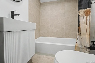 Beautifully updated 4 bedroom, 2 bath home featuring fresh paint - photo 9